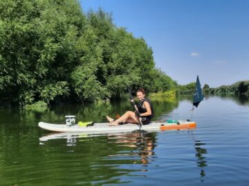 A teenager from Devon is returning to school this week having completed a 200km paddleboard during her summer. Image: Emily Read / Shelterbox.
