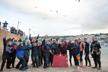 Rescuers and supporters who saved a Cornish seal after it became entangled with a plastic toy hoop. Image: The Sea Life Trust.