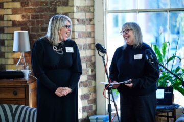 The Secrets from a Coach podcast team: wellness coach Debbie Green at Wishfish and TEDx speaker Laura Thomson-Staveley at Phenomenal Training.