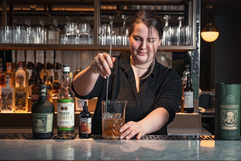 Former Dr Ink's Mixologist Amy Heaphy at work at Colson’s Restaurant and Bar. Image: Alys Miller at Dirty Martini Marketing.