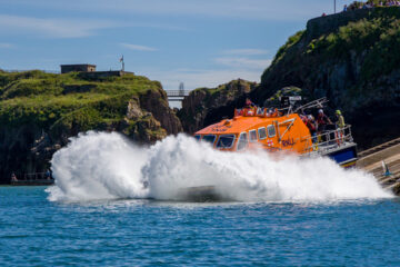 The RNLI Tamar class offshore lifeboat 'Haydn Miller' launches from the slipway at the lifeboat station in the resort town of Tenby, Pembrokeshire, Wales. Image: Richard Whitcombe / Shutterstock.