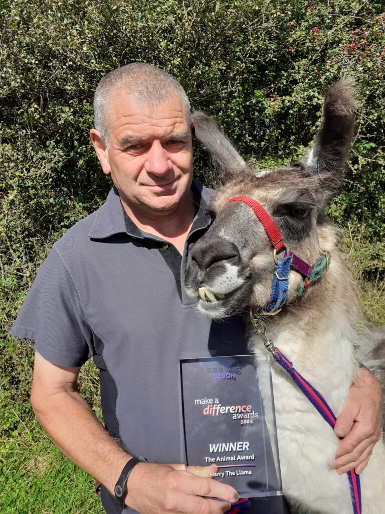 Harry and Paul Ferbrache with Harry's award.