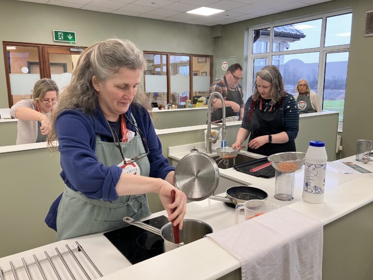 Westbank Wellbeing Day: the team cooking up healthy lunch options in the Community Cookery School. Image provided by Sharon Goble / If Media.