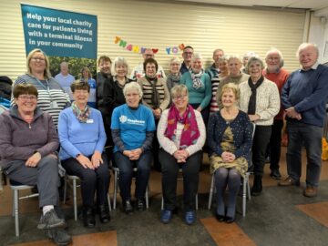 Volunteers celebrating the raising of £37,000 for local charity, Hospiscare. Image: Sue Cade / Otter Garden Centres.