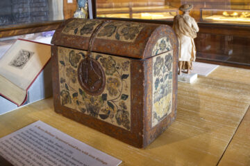 The Barniz de Pasto casket being put on display at Bateman's. Image: Laurence Perry / The National Trust.