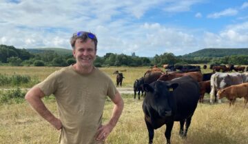 Jake Hancock is a National Trust tenant farmer at Purbeck. He is working with others to create new wood pastures for local wildlife. Image: Cathy Lewis / National Trust Images.
