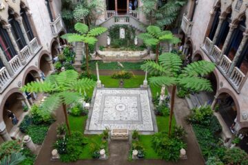 The interior courtyard of the Isabella Stewart Gardner Museum. It was built to evoke a 15th-century Venetian palace. The museum opened to the public in 1903. Image: Liz Albro Photography / Shutterstock.com