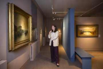 Petworth curator Emily Knight at the Turner’s Vision at Petworth exhibition. Image: © Megan Turner / National Trust Images.