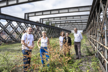 From left to right: Calum McGowan (Castlefield Forum), Helene Rossiter (National Highways), Jane Black (Castlefeild Forum), Cllr Bev Craig (Manchester City Council), Mike Innerdale (National Trust). Image: © Paul Harris / National Trust Images.