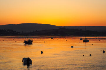 Sunset over the River Exe. Peter Moulton / Shutterstock.