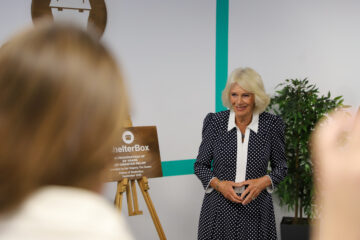 Her Majesty unveiling a commemorative plaque at the charity’s headquarters. Image provided by ShelterBox.