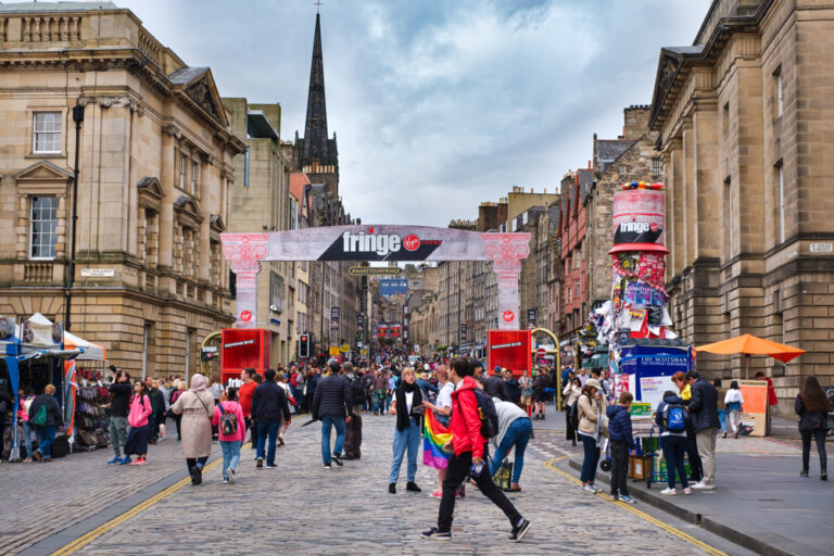 The Royal Mile in Edinburgh decorated for The Fringe festival. Image: Kamira / Shutterstock.
